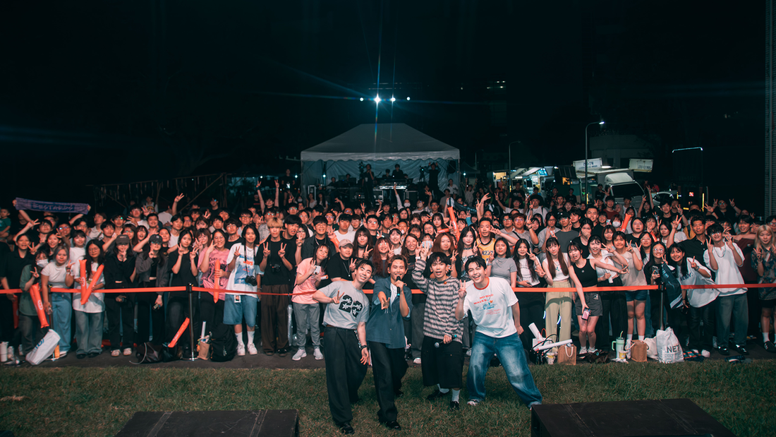 Bestards pose for a group photo with audience members following their performance, creating a memorable highlight of the graduation concert.(Open new window/png file)Image